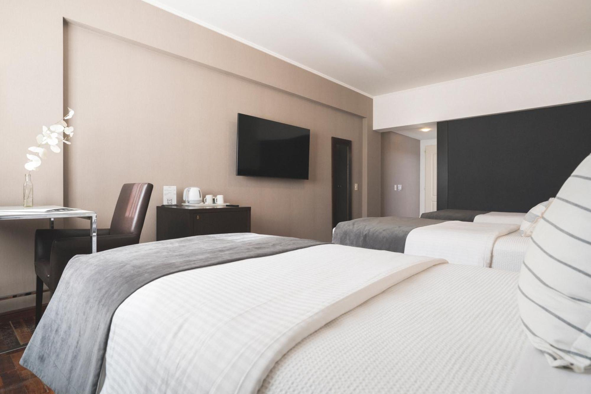 Hotel Tolosa Пуерто-Мадрин Номер фото