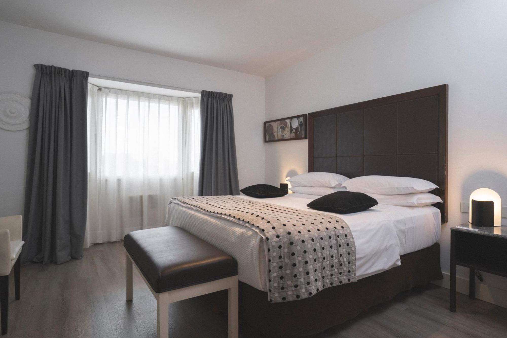 Hotel Tolosa Пуерто-Мадрин Номер фото