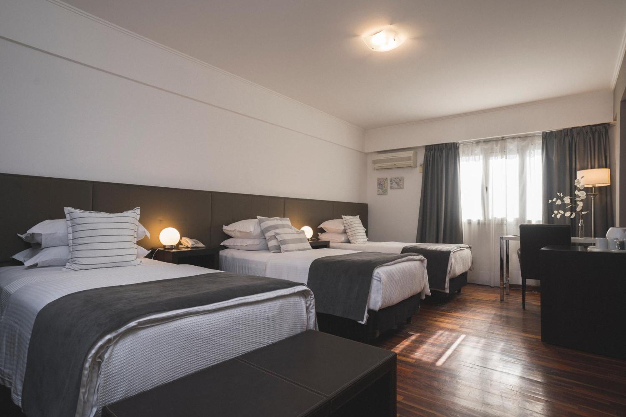 Hotel Tolosa Пуерто-Мадрин Номер фото
