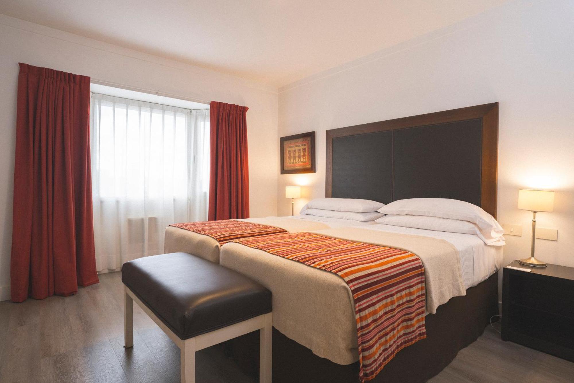 Hotel Tolosa Пуерто-Мадрин Номер фото