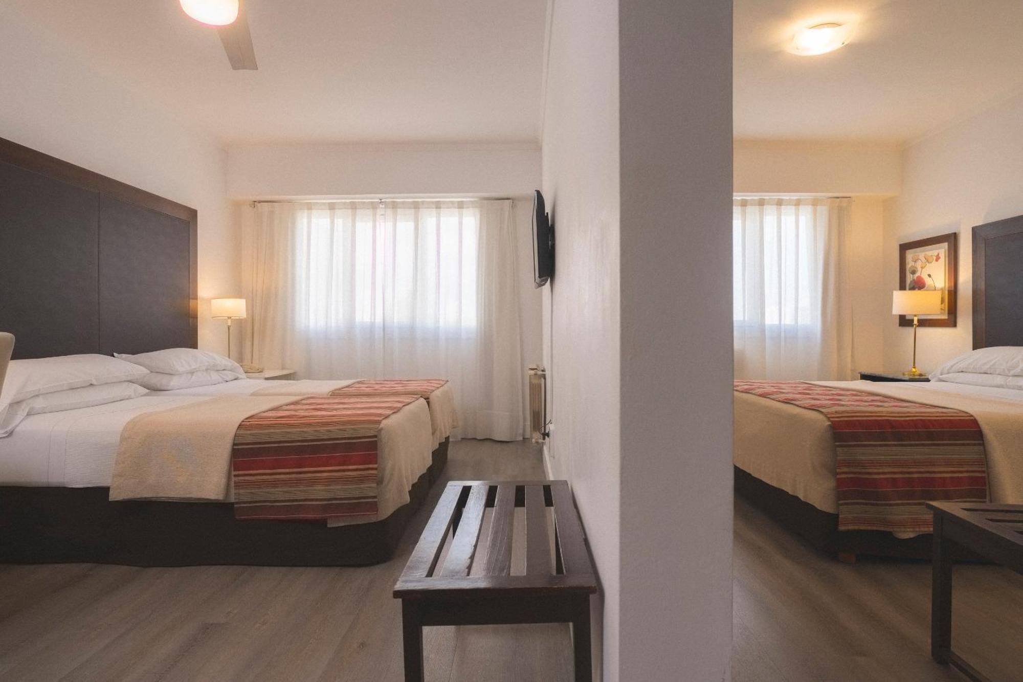 Hotel Tolosa Пуерто-Мадрин Номер фото