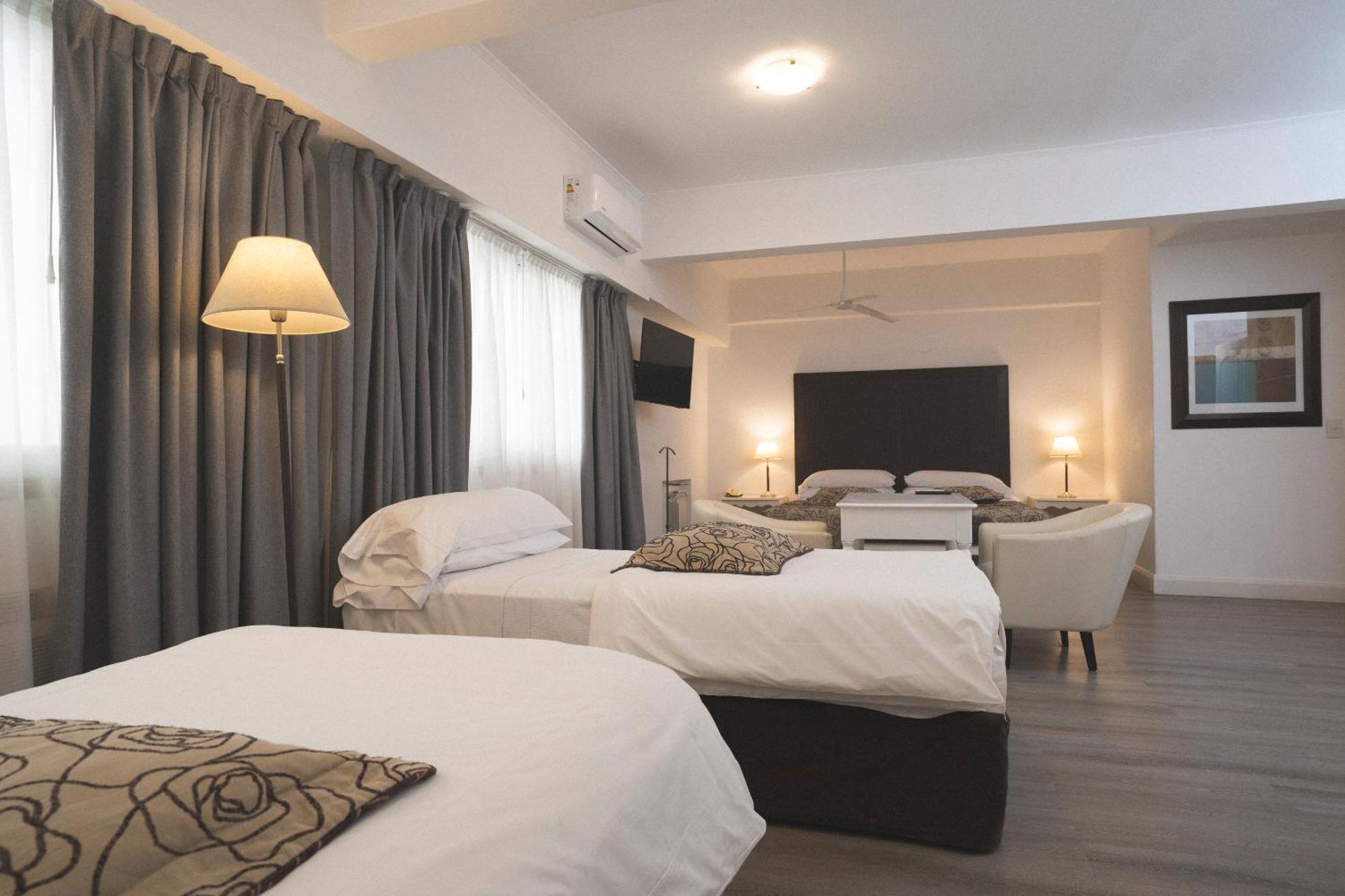 Hotel Tolosa Пуерто-Мадрин Номер фото